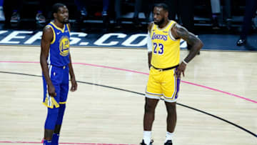 LAS VEGAS, NV- OCTOBER 10: LeBron James #23 of the Los Angeles Lakers and Kevin Durant #35 of the Golden State Warriors look on during the game on October 10, 2018 at T-Mobile Arena in Las Vegas, Nevada. NOTE TO USER: User expressly acknowledges and agrees that, by downloading and/or using this Photograph, user is consenting to the terms and conditions of the Getty Images License Agreement. Mandatory Copyright Notice: Copyright 2018 NBAE (Photo by Chris Elise/NBAE via Getty Images)