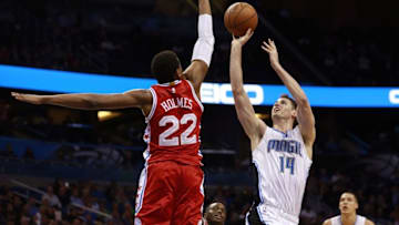 Feb 28, 2016; Orlando, FL, USA; Philadelphia 76ers forward Richaun Holmes (22) blocks Orlando Magic forward Jason Smith (14) shot during second half at Amway Center. Orlando Magic defeated the Philadelphia 76ers 130-116. Mandatory Credit: Kim Klement-USA TODAY Sports