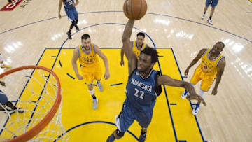 April 5, 2016; Oakland, CA, USA; Minnesota Timberwolves guard Andrew Wiggins (22) dunks the basketball against the Golden State Warriors during the second half at Oracle Arena. The Timberwolves defeated the Warriors 124-117. Mandatory Credit: Kyle Terada-USA TODAY Sports