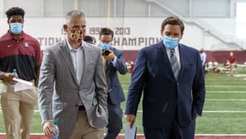 Florida Gov. Ron DeSantis and head coach Mike Norvell of the Florida State Seminoles Football Team (Photo by Don Juan Moore/Getty Images)