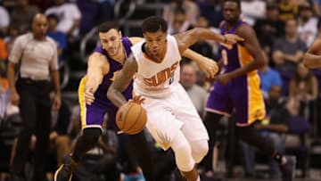 PHOENIX, AZ - FEBRUARY 15: Marquese Chriss #0 of the Phoenix Suns and Larry Nance Jr. #7 of the Los Angeles Lakers chase a loose ball during the second half of the NBA game at Talking Stick Resort Arena on February 15, 2017 in Phoenix, Arizona. The Pelicans defeated the Suns 110-108. NOTE TO USER: User expressly acknowledges and agrees that, by downloading and or using this photograph, User is consenting to the terms and conditions of the Getty Images License Agreement. (Photo by Christian Petersen/Getty Images)