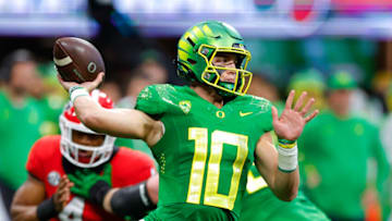 Twitter was bumping after former Auburn football QB Bo Nix threw his first interception as Oregon's starting signal-caller against Georgia (Photo by Todd Kirkland/Getty Images)