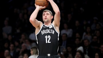 NEW YORK, NY - JANUARY 19: Joe Harris #12 of the Brooklyn Nets takes a shot against the Miami Heat in the first quarter during their game at Barclays Center on January 19, 2018 in the Brooklyn borough of New York City. NOTE TO USER: User expressly acknowledges and agrees that, by downloading and or using this photograph, User is consenting to the terms and conditions of the Getty Images License Agreement. (Photo by Abbie Parr/Getty Images)