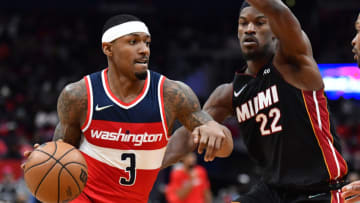 Washington Wizards guard Bradley Beal (3) dribbles the ball against Miami Heat forward Jimmy Butler (22)(Brad Mills-USA TODAY Sports)
