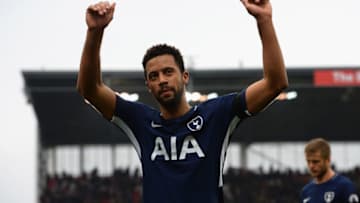 STOKE ON TRENT, ENGLAND - APRIL 07: Moussa Dembele of Tottenham Hotspur salutes the fans at the end of the Premier League match between Stoke City and Tottenham Hotspur at Bet365 Stadium on April 7, 2018 in Stoke on Trent, England. (Photo by Tony Marshall/Getty Images)