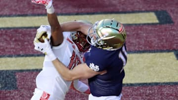 CHESTNUT HILL, MASSACHUSETTS - NOVEMBER 14: Ben Skowronek #11 of the Notre Dame Fighting Irish catches a touchdown pass over Brandon Sebastian #10 of the Boston College Eagles at Alumni Stadium on November 14, 2020 in Chestnut Hill, Massachusetts. (Photo by Maddie Meyer/Getty Images)