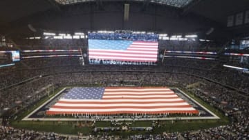 Sep 8, 2013; Arlington, TX, USA; A general view of the United States flag during the national anthem prior to the game with the Dallas Cowboys and New York Giants at AT&T Stadium. The Dallas Cowboys beat the New York Giants 36-31. Mandatory Credit: Tim Heitman-USA TODAY Sports