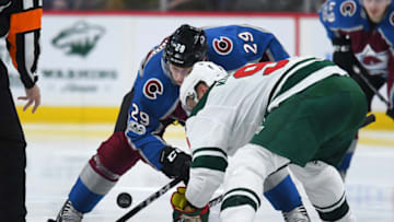 MINNEAPOLIS, MN - NOVEMBER 24: Colorado Avalanche Center Nathan MacKinnon (29) and Minnesota Wild Center Mikko Koivu (9) face-off during a NHL game between the Minnesota Wild and Colorado Avalanche on November 24, 2017 at Xcel Energy Center in St. Paul, MN.The Wild defeated the Avalanche 3-2 in a shootout.(Photo by Nick Wosika/Icon Sportswire via Getty Images)