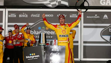 DAYTONA BEACH, FLORIDA - FEBRUARY 13: Joey Logano, driver of the #22 Shell Pennzoil Ford, celebrates in victory lane after winning the NASCAR Cup Series Bluegreen Vacations Duel 1 at Daytona International Speedway on February 13, 2020 in Daytona Beach, Florida. (Photo by Brian Lawdermilk/Getty Images)
