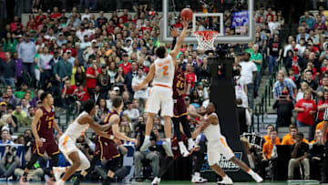 DALLAS, TX - MARCH 17: Aundre Jackson #24 of the Loyola Ramblers fouls Grant Williams #2 of the Tennessee Volunteers during a shot attempt in the second half during the second round of the 2018 NCAA Tournament at the American Airlines Center on March 17, 2018 in Dallas, Texas. (Photo by Tom Pennington/Getty Images)