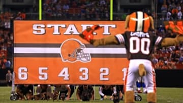 Aug 15, 2013; Cleveland, OH, USA; Cleveland Browns mascot Chimp starts the first annual wiener dog race in the second quarter of a preseason game against the Detroit Lions at FirstEnergy Stadium. Mandatory Credit: Andrew Weber-USA TODAY Sports