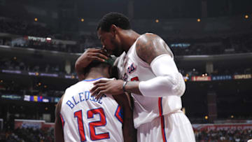 LOS ANGELES, CA - APRIL 4: DeAndre Jordan #6 and Eric Bledsoe #12 of the Los Angeles Clippers come together during their game against the Los Angeles Lakers at Staples Center on April 4, 2012 in Los Angeles, California. NOTE TO USER: User expressly acknowledges and agrees that, by downloading and/or using this Photograph, user is consenting to the terms and conditions of the Getty Images License Agreement. Mandatory Copyright Notice: Copyright 2012 NBAE (Photo by Noah Graham/NBAE via Getty Images)