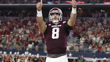 Sep 24, 2016; Dallas, TX, USA; Texas A&M Aggies quarterback Trevor Knight (8) celebrates scoring a touchdown in the second quarter against the Arkansas Razorbacks at AT&T Stadium. Mandatory Credit: Tim Heitman-USA TODAY Sports