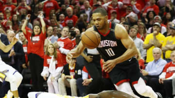 HOUSTON, TX - MAY 24: Eric Gordon #10 of the Houston Rockets steals from Draymond Green #23 of the Golden State Warriors late in the fourth quater of Game Five of the Western Conference Finals of the 2018 NBA Playoffs at Toyota Center on May 24, 2018 in Houston, Texas. NOTE TO USER: User expressly acknowledges and agrees that, by downloading and or using this photograph, User is consenting to the terms and conditions of the Getty Images License Agreement. (Photo by Ronald Martinez/Getty Images)