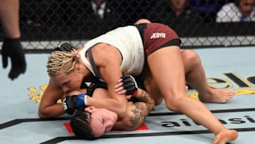 LAS VEGAS, NV - OCTOBER 06: Yana Kunitskaya of Russia grapples with Lina Lansberg of Sweden in their women's bantamweight bout during the UFC 229 event inside T-Mobile Arena on October 6, 2018 in Las Vegas, Nevada. (Photo by Josh Hedges/Zuffa LLC/Zuffa LLC)