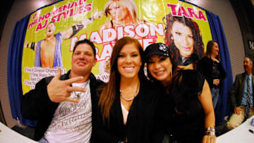 LOUISVILLE, KY - FEBRUARY 25: TNA Wrestlers AJ Styles, Madison Rayne, and Tara attends the 48th Annual Carl Casper's Custom and Louisville auto show at the Kentucky Exposition Center on February 25, 2011 in Louisville, Kentucky. (Photo by Stephen J. Cohen/Getty Images)