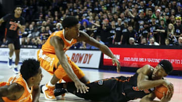 Jan 7, 2017; Gainesville, FL, USA; Florida Gators guard KeVaughn Allen (5) protects the ball from diving Tennessee Volunteers guard Jordan Bowden (23) and forward Kyle Alexander (11) during the first half of an NCAA men's basketball game in the Exactech Arena at the Stephen C. O'Connell Center. Mandatory Credit: Reinhold Matay-USA TODAY Sports