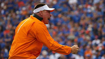 GAINESVILLE, FL - SEPTEMBER 26: Head coach Butch Jones of the Tennessee Volunteers cheers during a game against the Florida Gators at Ben Hill Griffin Stadium on September 26, 2015 in Gainesville, Florida. (Photo by Mike Ehrmann/Getty Images)