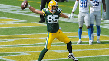 Sep 20, 2020; Green Bay, Wisconsin, USA; Green Bay Packers tight end Robert Tonyan (85) spikes the ball after catching a touchdown pass in the second quarter at Lambeau Field. Mandatory Credit: Michael McLoone-USA TODAY Sports