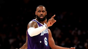 LOS ANGELES, CALIFORNIA - DECEMBER 31: LeBron James #6 of the Los Angeles Lakers reacts to a play during the second quarter against the Portland Trail Blazers at Crypto.com Arena on December 31, 2021 in Los Angeles, California. NOTE TO USER: User expressly acknowledges and agrees that, by downloading and or using this photograph, User is consenting to the terms and conditions of the Getty Images License Agreement. (Photo by Katelyn Mulcahy/Getty Images)