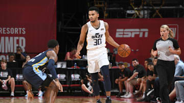 LAS VEGAS, NV - JULY 14: Naz Mitrou-Long #30 of the Utah Jazz handles the ball against the Memphis Grizzlies during the 2018 Las Vegas Summer League on July 14, 2018 at the Thomas & Mack Center in Las Vegas, Nevada. Copyright 2018 NBAE (Photo by Garrett Ellwood/NBAE via Getty Images)