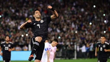 Raul Jimenez (C) of Mexico celebrates after scoring a penalty against Chile during the international friendly match between Mexico and Chile at SDCCU Stadium in San Diego, California on March 22, 2019. (Photo by Frederic J. BROWN / AFP) (Photo credit should read FREDERIC J. BROWN/AFP/Getty Images)