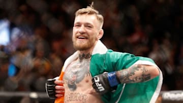 LAS VEGAS, NV - DECEMBER 12: Conor McGregor celebrates after a first-round knockout victory over Jose Aldo in their featherweight title fight during UFC 194 on December 12, 2015 in Las Vegas, Nevada. (Photo by Steve Marcus/Getty Images)