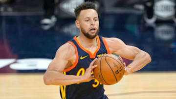 SAN FRANCISCO, CALIFORNIA - APRIL 09: Stephen Curry #30 of the Golden State Warriors looks to pass the ball against the Washington Wizards during the second half of an NBA basketball game at Chase Center on April 09, 2021 in San Francisco, California. NOTE TO USER: User expressly acknowledges and agrees that, by downloading and or using this photograph, User is consenting to the terms and conditions of the Getty Images License Agreement. (Photo by Thearon W. Henderson/Getty Images)
