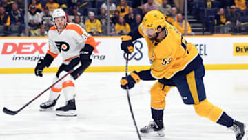 Mar 27, 2022; Nashville, Tennessee, USA; Nashville Predators defenseman Roman Josi (59) shoots the puck during the first period against the Philadelphia Flyers at Bridgestone Arena. Mandatory Credit: Christopher Hanewinckel-USA TODAY Sports
