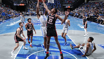 Malcolm Dandridge #23 of the Memphis Tigers has a shot attempt blocked by Jamarion Sharp #33 of the Western Kentucky Hilltoppers (Photo by Joe Murphy/Getty Images)