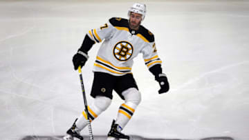 RALEIGH - MAY 16: Bruins defenseman John Moore skates over the Stanley Cup during pre game warmups. The Boston Bruins visited the Carolina Hurricanes for Game Four of the Stanley Cup Eastern Conference Finals NHL playoff series at PNC Arena in Raleigh, North Carolina. (Photo by Jim Davis/The Boston Globe via Getty Images)