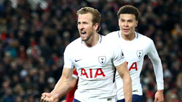 LIVERPOOL, ENGLAND - FEBRUARY 04: Harry Kane of Tottenham Hotspur celebrates after scoring his sides second goal and his 100th Premier League goal during the Premier League match between Liverpool and Tottenham Hotspur at Anfield on February 4, 2018 in Liverpool, England. (Photo by Clive Brunskill/Getty Images)