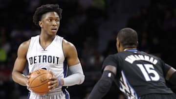 Dec 31, 2015; Auburn Hills, MI, USA; Detroit Pistons forward Stanley Johnson (3) holds the ball against Minnesota Timberwolves forward Shabazz Muhammad (15) during the third quarter at The Palace of Auburn Hills. Pistons win 115-90. Mandatory Credit: Raj Mehta-USA TODAY Sports