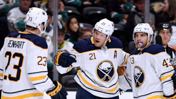 ANAHEIM, CA - OCTOBER 21: Kyle Okposo #21 of the Buffalo Sabres celebrates his goal with Sam Reinhart #23 and Conor Sheary #43 to trail 2-1 to the Anaheim Ducks during the second period at Honda Center on October 21, 2018 in Anaheim, California. (Photo by Harry How/Getty Images)