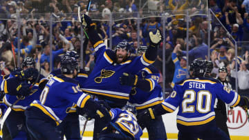 St. Louis Blues left wing Pat Maroon (7) is congratulated by teammates after scoring the game winning goal in double overtime in game seven of the second round of the 2019 Stanley Cup Playoffs against the Dallas Stars at Enterprise Center. Mandatory Credit: Jeff Curry-USA TODAY Sports