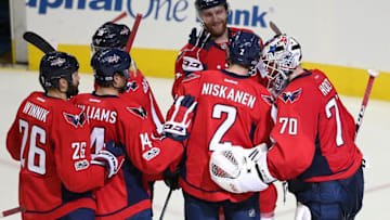 Jan 1, 2017; Washington, DC, USA; Washington Capitals goalie Braden Holtby (70) celebrates with teammates after defeating the Ottawa Senators 2-1 at Verizon Center. Mandatory Credit: Amber Searls-USA TODAY Sports