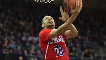 SEATTLE, WASHINGTON - JANUARY 30: Jemarl Baker Jr. #10 of the Arizona Wildcats takes a shot against the Washington Huskies in the second half during their game at Hec Edmundson Pavilion on January 30, 2020 in Seattle, Washington. (Photo by Abbie Parr/Getty Images)