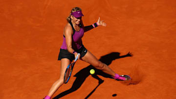 MADRID, SPAIN - MAY 02: Victoria Azarenka of Belarus plays a forehand against Alize Cornet of France in their second round match during day three of the Mutua Madrid Open tennis tournament at the Caja Magica on May 02, 2016 in Madrid,Spain. (Photo by Clive Brunskill/Getty Images)