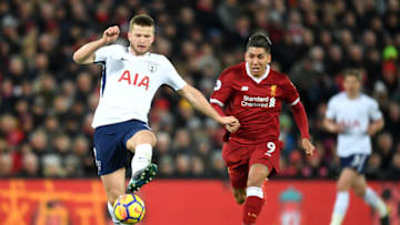 LIVERPOOL, ENGLAND - FEBRUARY 04: Eric Dier of Tottenham Hotspur is challenged by Roberto Firmino of Liverpool during the Premier League match between Liverpool and Tottenham Hotspur at Anfield on February 4, 2018 in Liverpool, England. (Photo by Michael Regan/Getty Images)