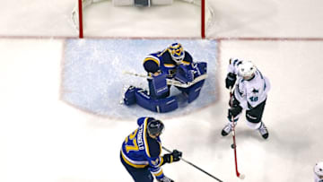 May 15, 2016; St. Louis, MO, USA; San Jose Sharks center Tomas Hertl (48) deflects a shot for a goal in front of St. Louis Blues goalie Brian Elliott (1) during the first period in game one of the Western Conference Final of the 2016 Stanley Cup Playoffs at Scottrade Center. The Blues won the game 2-1. Mandatory Credit: Billy Hurst-USA TODAY Sports