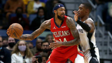 New Orleans Pelicans forward Brandon Ingram (14) is defended by San Antonio Spurs guard Lonnie Walker IV Credit: Chuck Cook-USA TODAY Sports