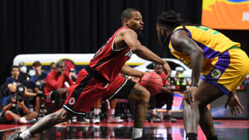 LAS VEGAS, NEVADA - JULY 17: Isaiah Briscoe #13 of Trilogy drives to the basket against Kevin Murphy #55 of 3 Headed Monsters in the first half during the second week of the BIG3 at the Orleans Arena on July 17, 2021 in Las Vegas, Nevada. (Photo by Sam Morris/Getty Images for BIG3)