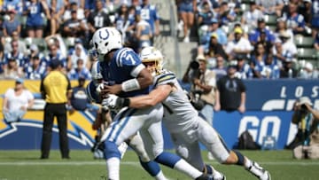 CARSON, CALIFORNIA - SEPTEMBER 08: Jacoby Brissett #7 of the Indianapolis Colts is sacked by Joey Bosa #97 of the Los Angeles Chargers in the third quarter at Dignity Health Sports Park on September 08, 2019 in Carson, California. The Chargers defeated the Colts 30-24 in overtime. (Photo by Jeff Gross/Getty Images)