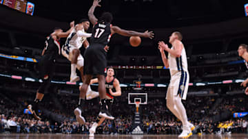 DENVER, CO - JANUARY 22: Gary Harris #14 of the Denver Nuggets passes the ball against the Portland Trail Blazers on January 22, 2018 at the Pepsi Center in Denver, Colorado. NOTE TO USER: User expressly acknowledges and agrees that, by downloading and/or using this Photograph, user is consenting to the terms and conditions of the Getty Images License Agreement. Mandatory Copyright Notice: Copyright 2018 NBAE (Photo by Garrett Ellwood/NBAE via Getty Images)