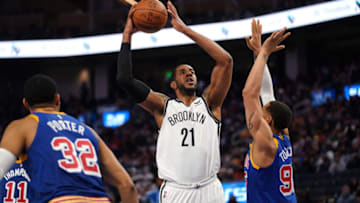 Jan 29, 2022; San Francisco, California, USA; Brooklyn Nets forward LaMarcus Aldridge (21) shoots the ball against Golden State Warriors forward Juan Toscano-Anderson (95) in the fourth quarter at the Chase Center. Mandatory Credit: Cary Edmondson-USA TODAY Sports