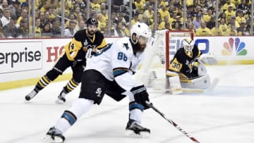 Jun 9, 2016; Pittsburgh, PA, USA; Pittsburgh Penguins goalie Matt Murray (30) and left wing Chris Kunitz (14) defend the net as San Jose Sharks defenseman Brent Burns (88) prepares to shoot the puck in the first period game five of the 2016 Stanley Cup Final at Consol Energy Center. Mandatory Credit: Don Wright-USA TODAY Sports