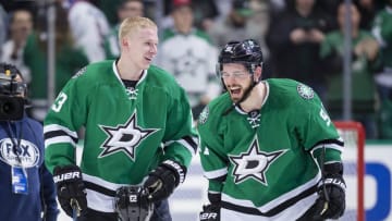 Dec 23, 2016; Dallas, TX, USA; Dallas Stars defenseman Esa Lindell (23) and center Tyler Seguin (91) celebrate Lindell