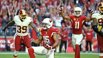 Dec 4, 2016; Glendale, AZ, USA; Arizona Cardinals wide receiver Michael Floyd (15) celebrates a third quarter touchdown against the Washington Redskins at University of Phoenix Stadium. The Cardinals defeated the Redskins 31-23. Mandatory Credit: Mark J. Rebilas-USA TODAY Sports