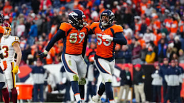 Oct 31, 2021; Denver, Colorado, USA; Denver Broncos outside linebacker Malik Reed (59) celebrates his fourth quarter sack with linebacker Jonathon Cooper (53) against the Washington Football Team at Empower Field at Mile High. Mandatory Credit: Ron Chenoy-USA TODAY Sports
