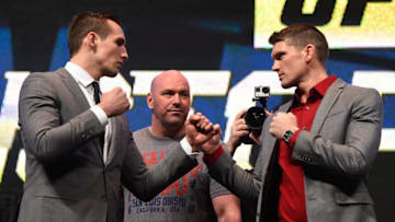 LAS VEGAS, NV - MARCH 04: (L-R) Opponents Rory MacDonald and Stephen Thompson face off during the UFC Unstoppable launch press conference at the MGM Grand Garden Arena on March 4, 2016 in Las Vegas, Nevada. (Photo by Josh Hedges/Zuffa LLC/Zuffa LLC via Getty Images)